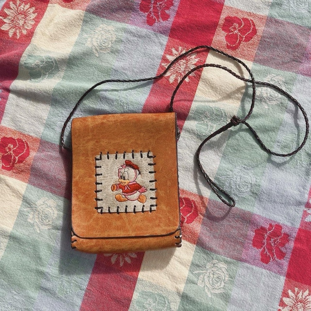 vintage baby donald duck tooled brown leather purse with braided strap